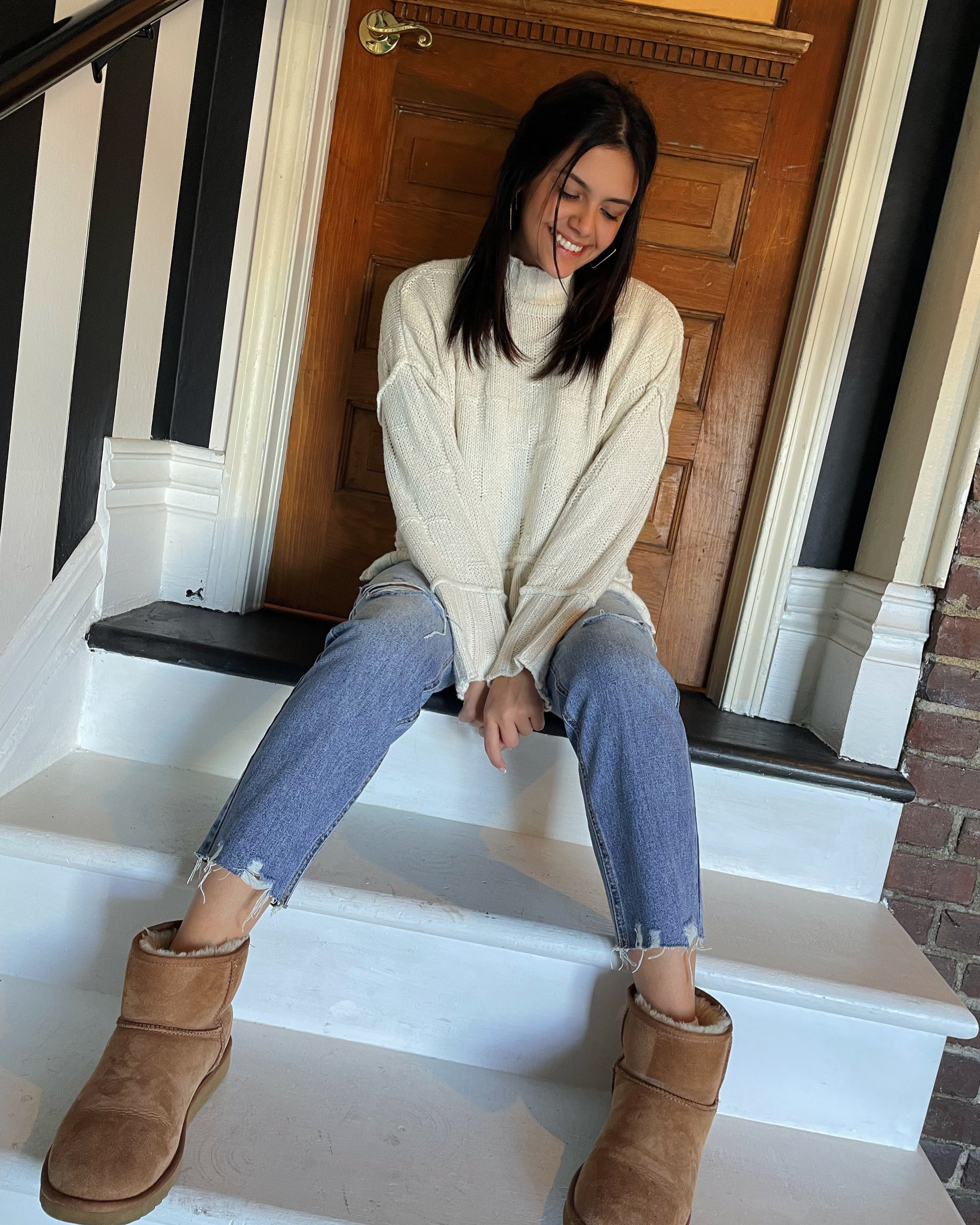White cross sweater 2025